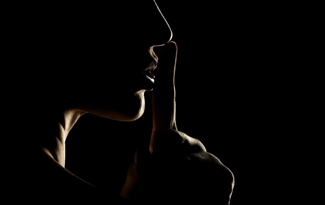 Silhouette,Of,Unknown,Woman,With,The,Face,In,The,Shadow